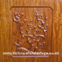 example of the hand carved Bird and Flower design found on a Rosewood door.
